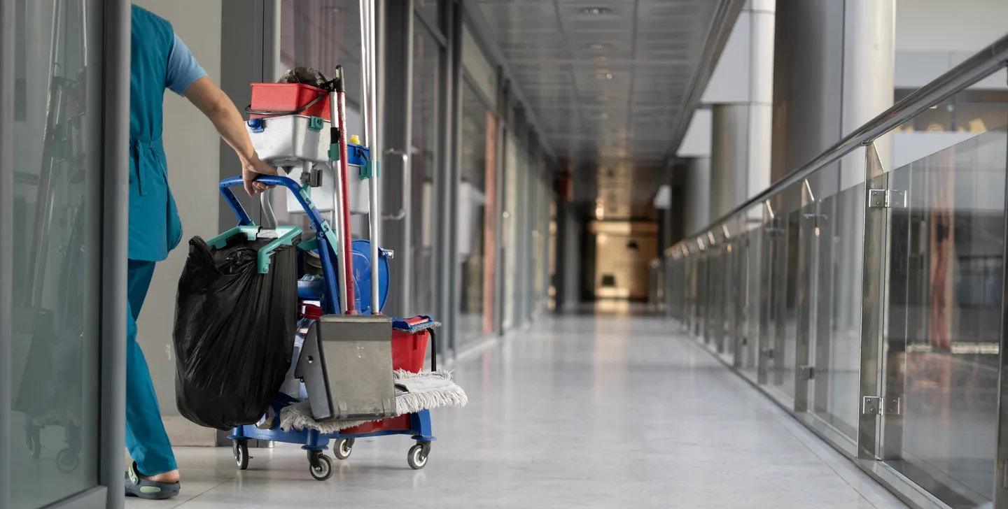 A cleaning trolley in a shared building corridor